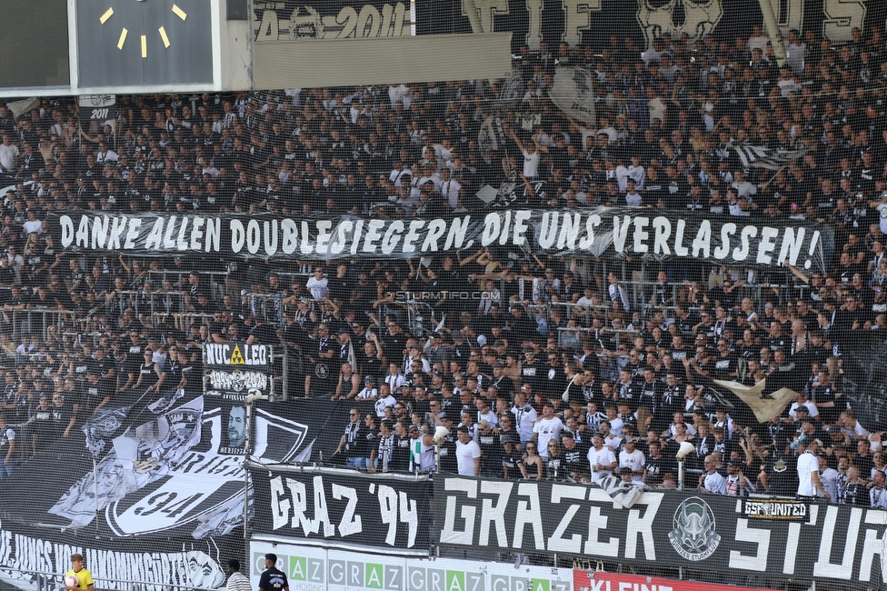 Sturm Graz - Hartberg
Oesterreichische Fussball Bundesliga, 2. Runde, SK Sturm Graz - TSV Hartberg, Stadion Liebenau Graz, 11.08.2024. 

Foto zeigt Fans von Sturm mit einem Spruchband
