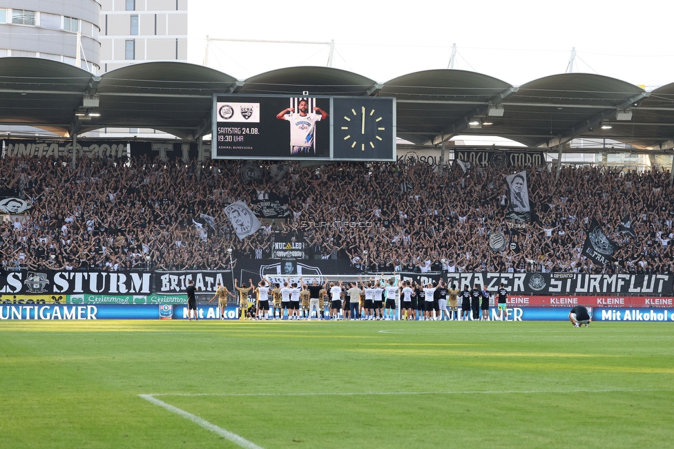 Sturm Graz - Hartberg
Oesterreichische Fussball Bundesliga, 2. Runde, SK Sturm Graz - TSV Hartberg, Stadion Liebenau Graz, 11.08.2024. 

Foto zeigt Fans von Sturm und die Mannschaft von Sturm
