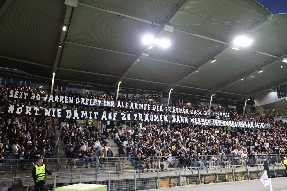 Sturm Graz - Heart of Midlothian
UEFA Champions League Qualifikation 2. Runde, SK Sturm Graz - Heart of Midlothian, Stadion Liebenau Graz, 21.07.2026. Foto zeigt Fans von Sturm mit einem Spruchband
