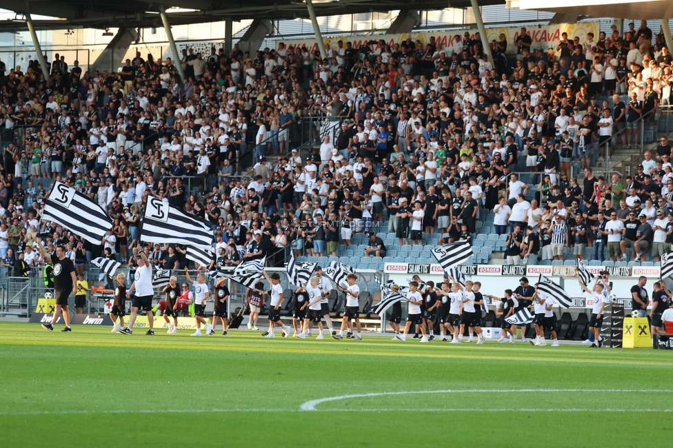 Sturm Graz - Altach
Oesterreichische Fussball Bundesliga, 3. Runde, SK Sturm Graz - SC Rheindorf Altach, Stadion Graz-Liebenau, 15.08.2026. 

Foto zeigt Kinder mit Sturmfahnen
